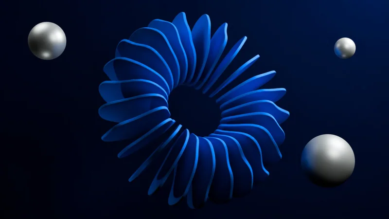 Cobalt radial sculpture with three silver spheres on midnight blue